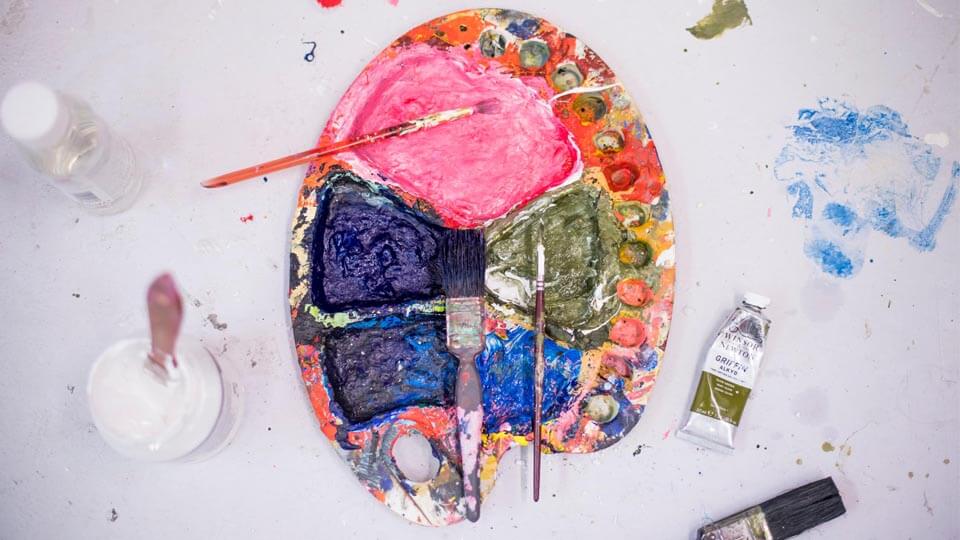 paint pallet with different colour paints