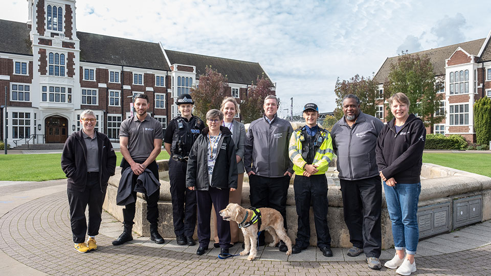 the Community Wardens standing in front of the fountain