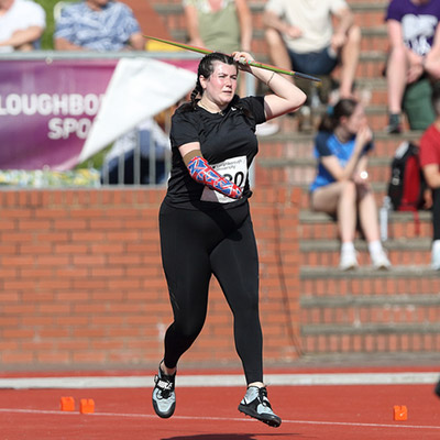 Hollie Arnold throwing a javelin