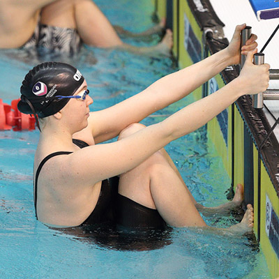 Honey Osrin getting ready to start a race in the pool