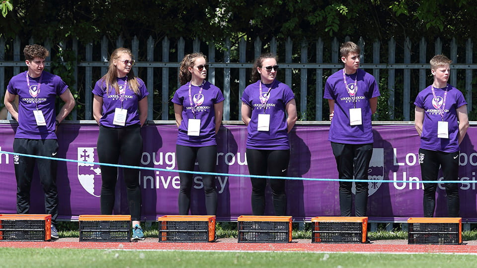 students in a line during an athletics competition