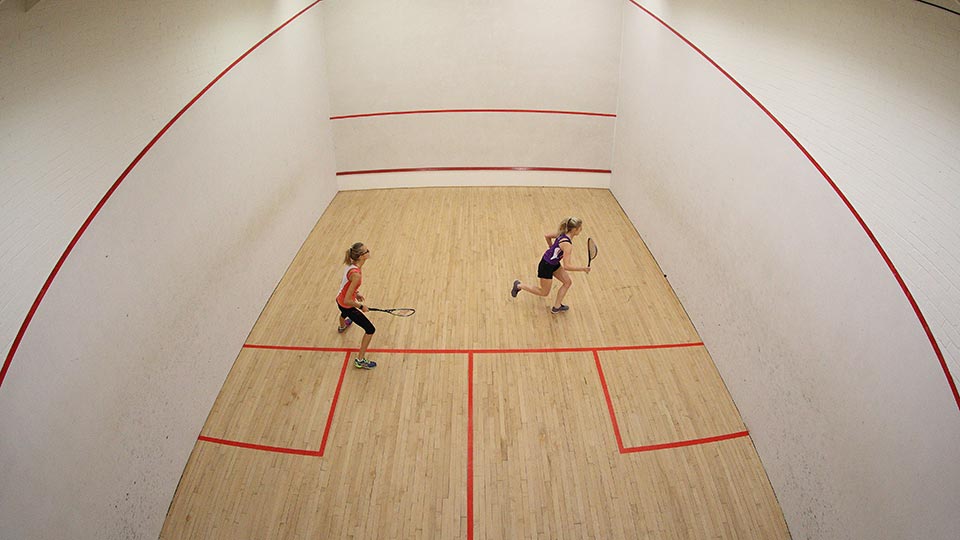 Squash game in action