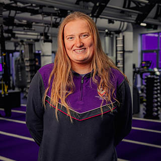 Joanna is smiling for a headshot wearing Loughborough Sport kit.
