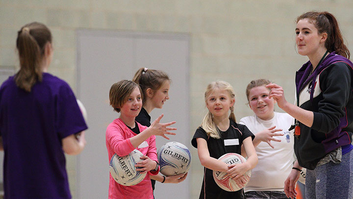 Smiling children during netball camp