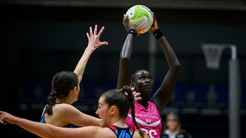 Mary Cholhok shooting at goal