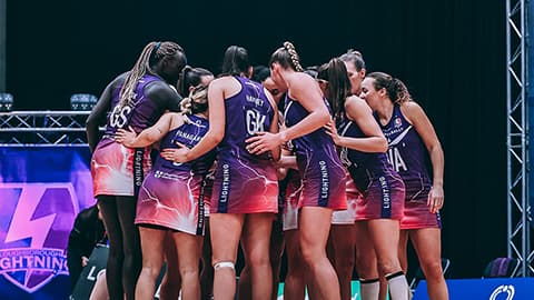 Loughborough Lightning in a team huddle