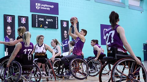 wheelchair basketballer taking a shot