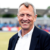 A headshot of Jack Buckner smiling