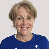 A headshot photo of Penny Briscoe smiling
