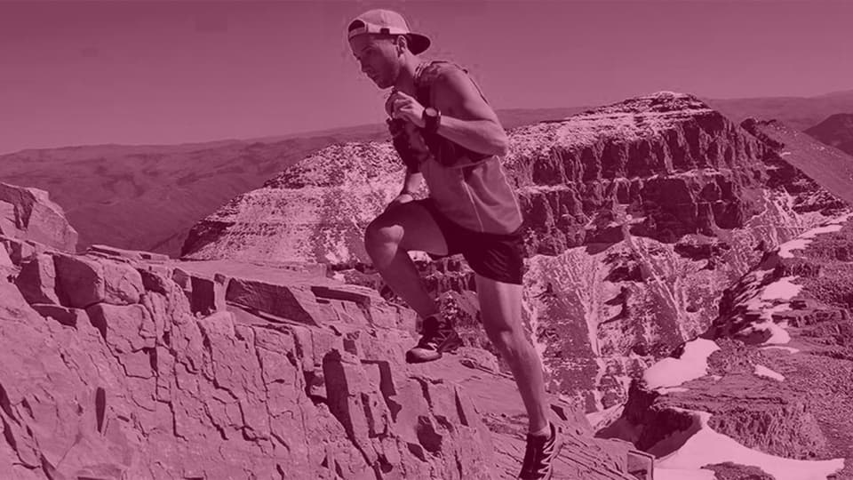 a runner in a mountain landscape