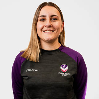 Katie is wearing a Loughborough Sport jumper and is smiling for a headshot.