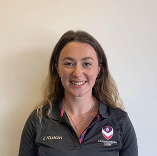 Lois is smiling, wearing a Loughborough Sport top.