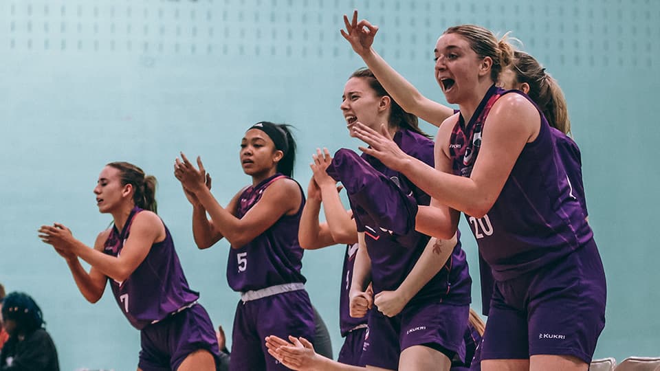 players cheering and clapping