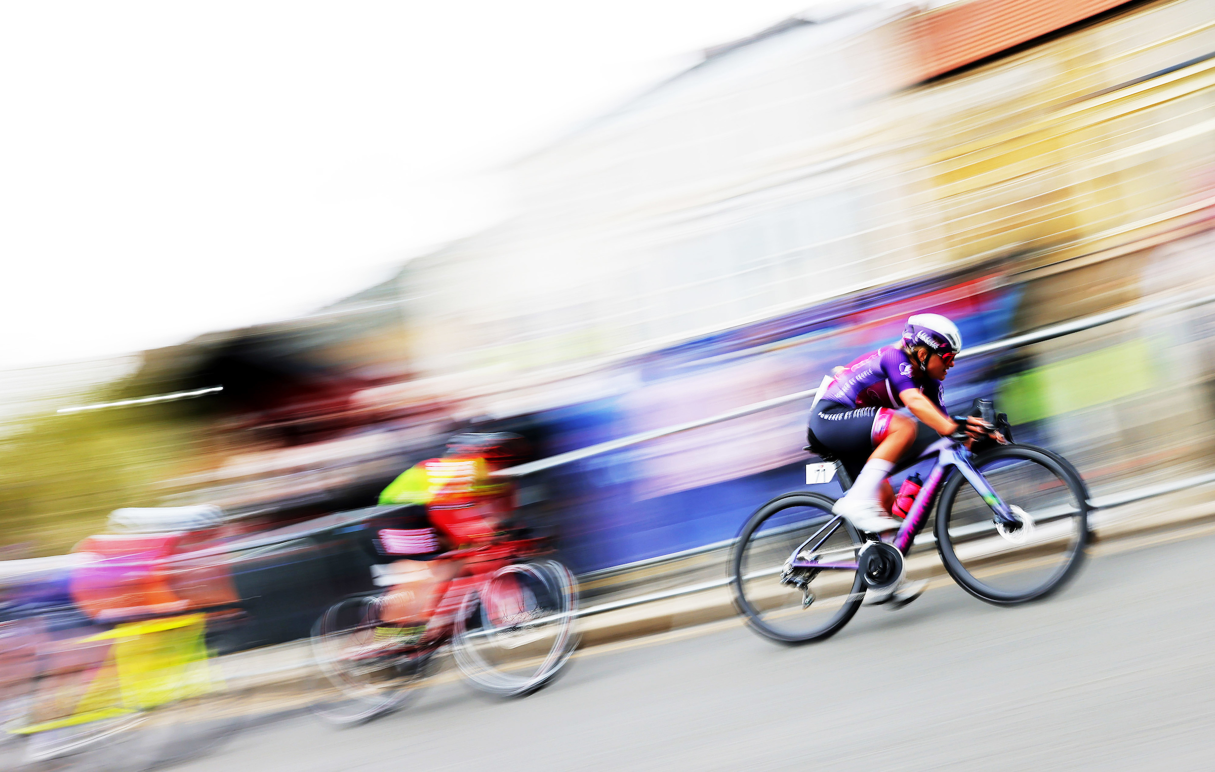 cyclists racing the photo has background blur