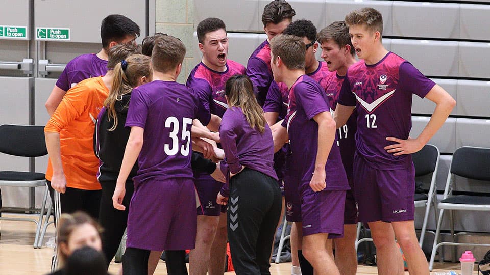 a team of handball players on the court