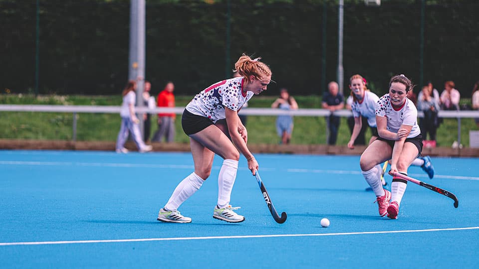 two players at the hockey match face-off