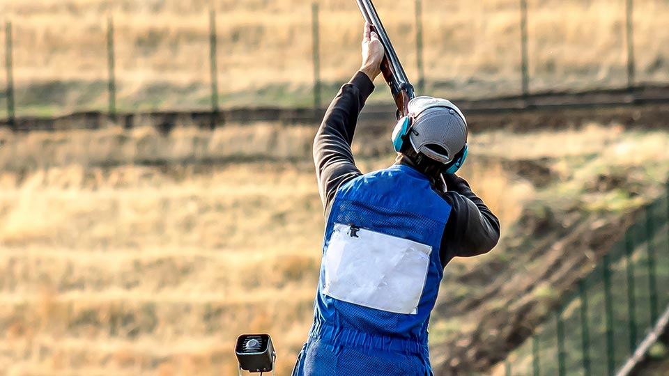 A person holding a rifle during training practice