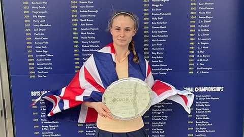 Hollie holding the trophy