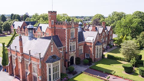 a large red brick building seen from the air