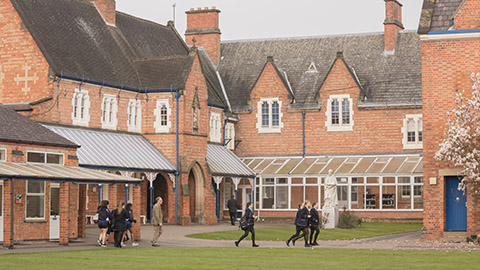 pupils outside a school