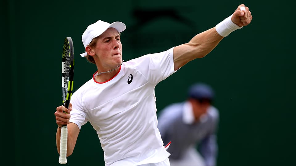Henry Searle celebrating a Wimbledon win