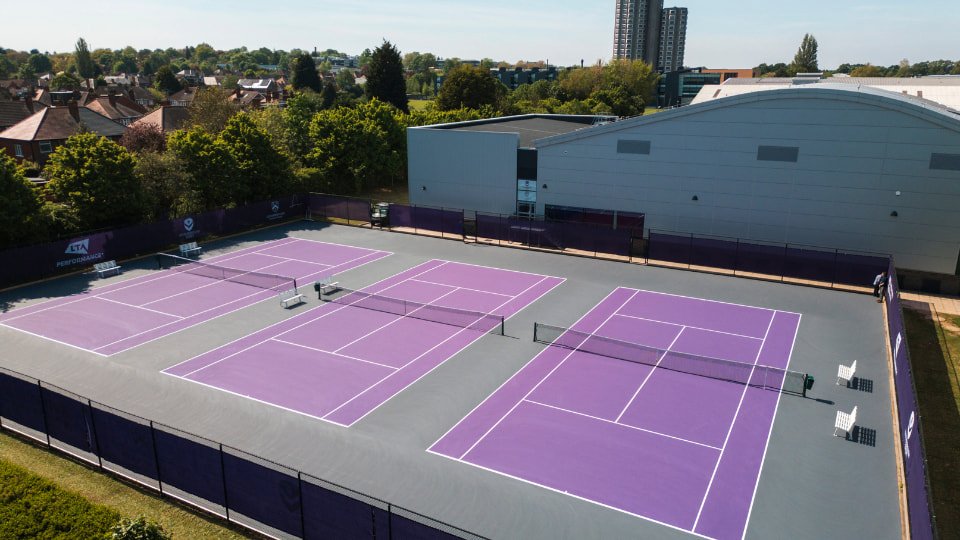 Purple and grey outdoor tennis courts