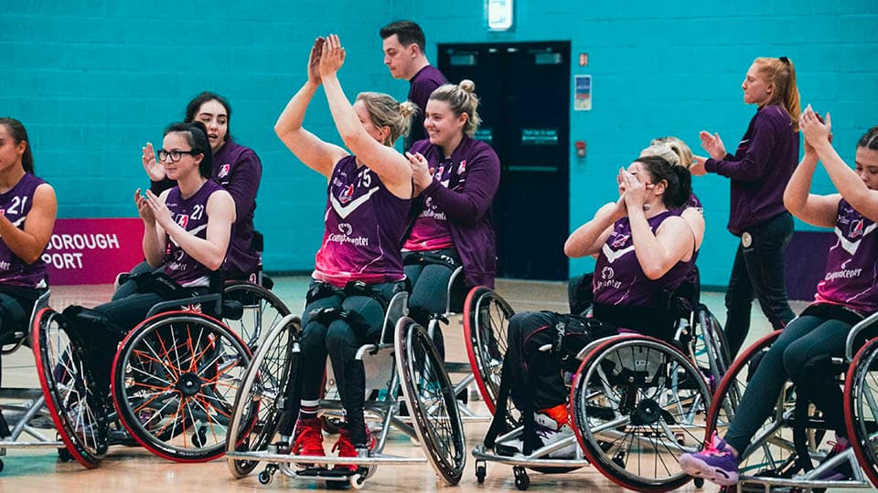 The team are celebrating after a win.