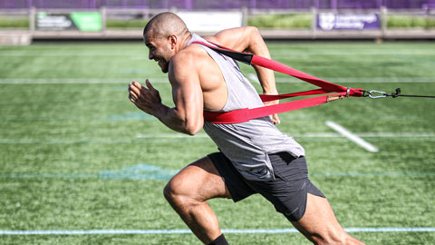 a man training wearing a harness