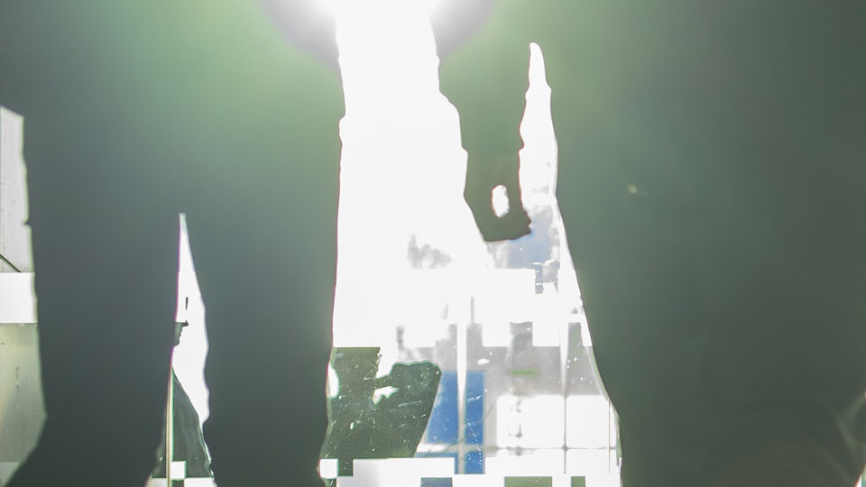 silhouetted group of people walking