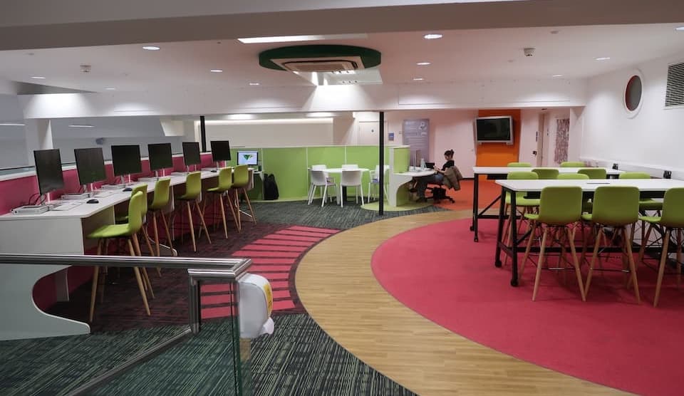 James France Mezzanine - colourful study space with multiple seating and desk options.