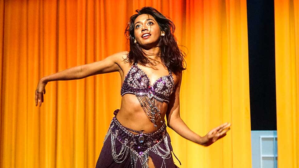 A dancer performing on stage.