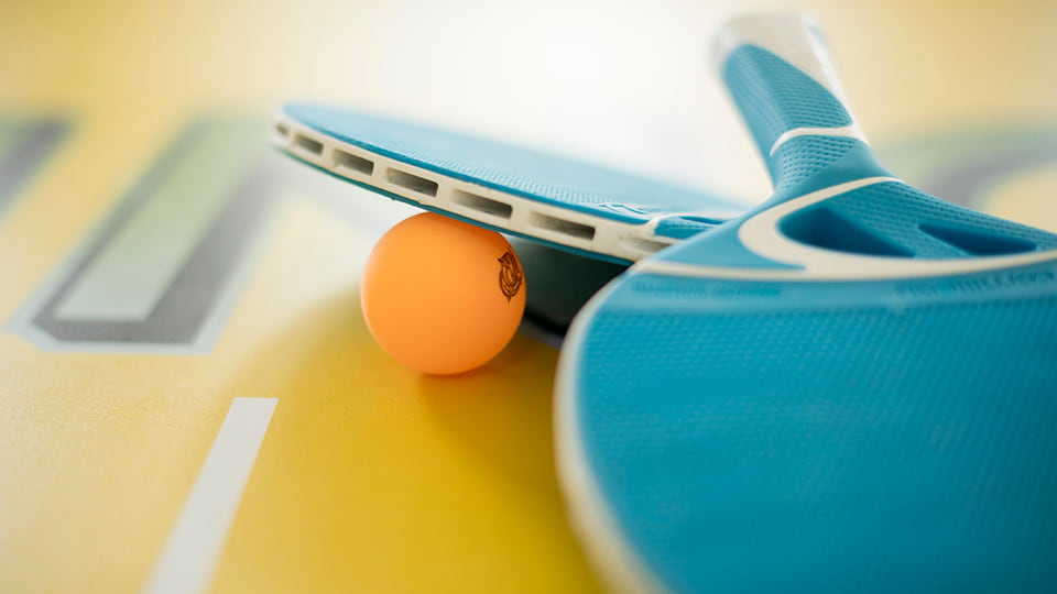 Sport rackets and a ball