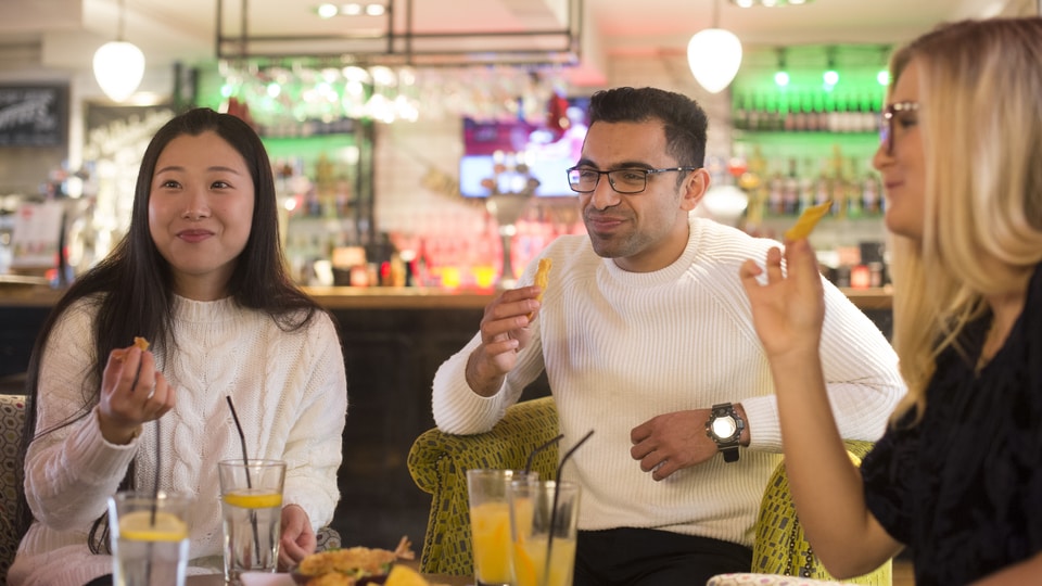 Three students eating