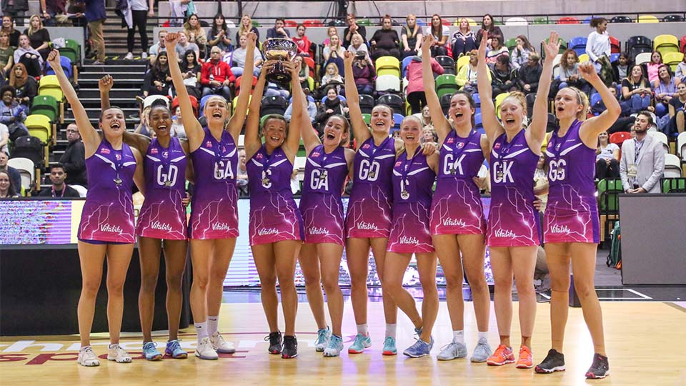 Sporting opportunities, female team celebrating.