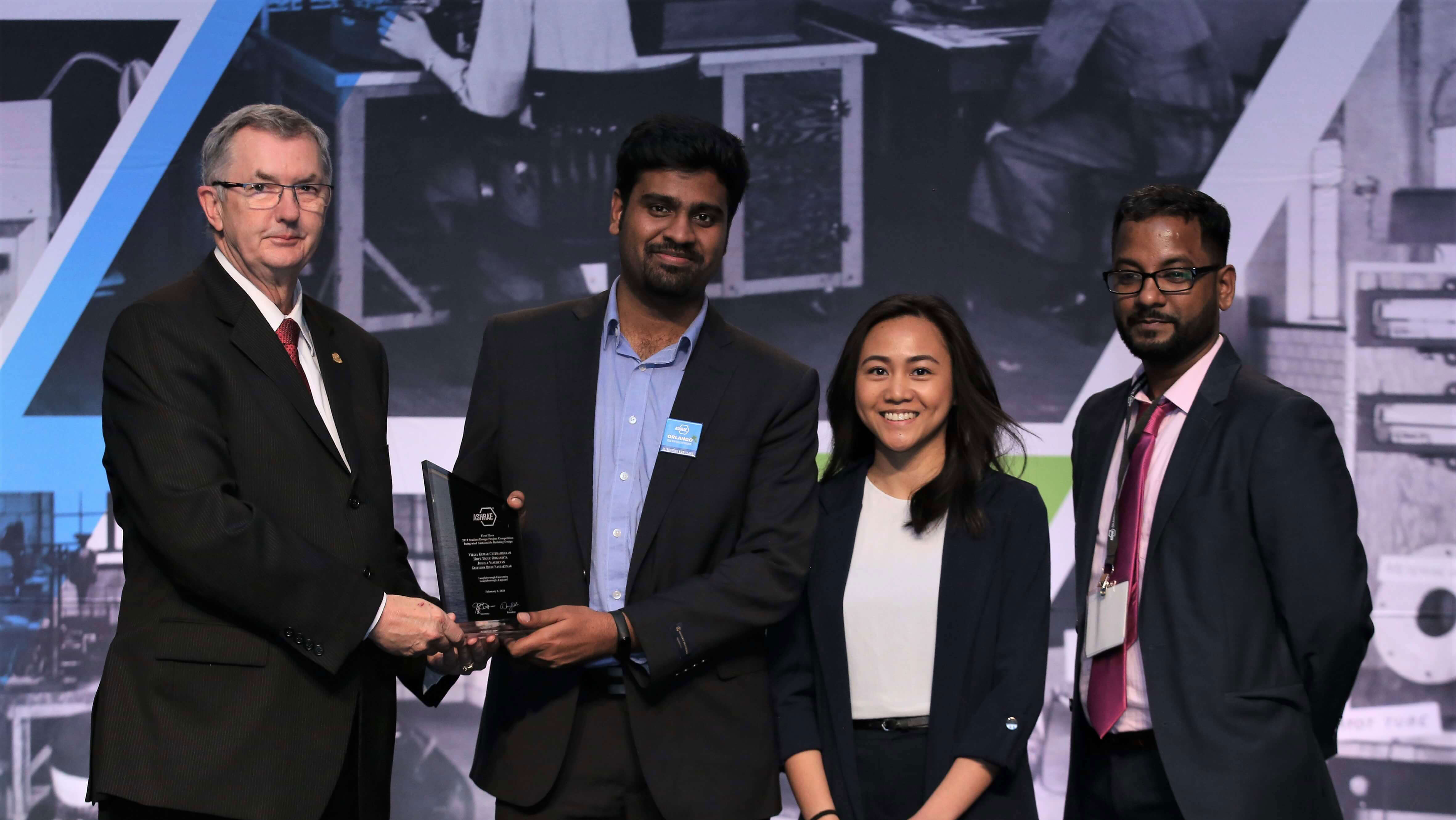 Joshua winning an award