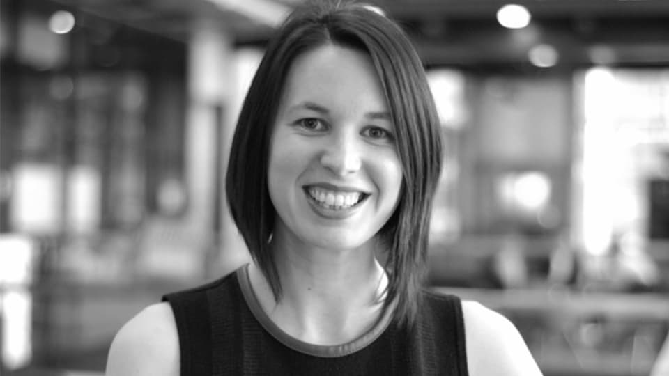 A black and white profile picture of Claire