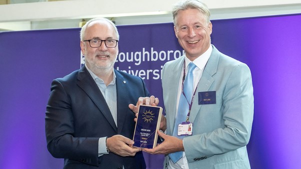 Matt being presented an award by Professor Nick Jennings