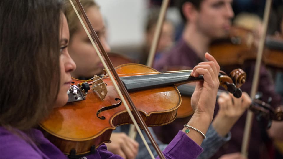 Students playing the violin