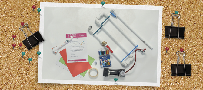 photo of the components for a model rocket clipped to a notice board