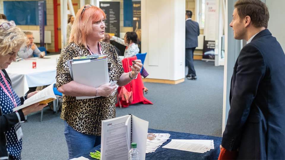 teachers at the conference on campus