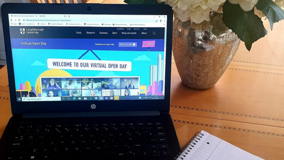 A Laptop with Loughborough University's virtual open day open on it. 