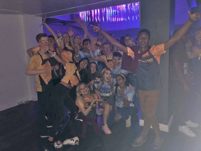 A group of freshers and fresher helpers on a night out in Loughborough's students union.