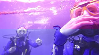 Gemma scuba diving in Australia on her year abroad