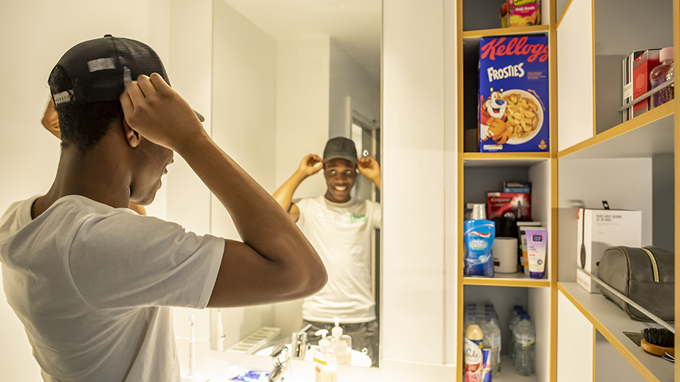 Tobe looking in the mirror