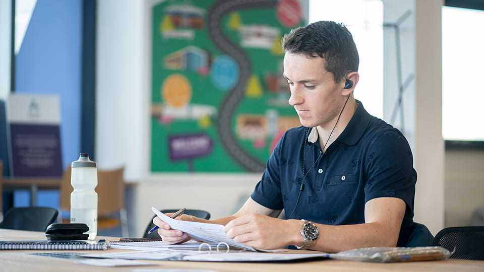male student studying