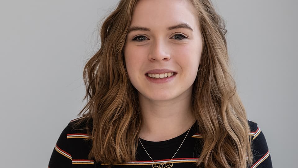 Lauren smiling at camera