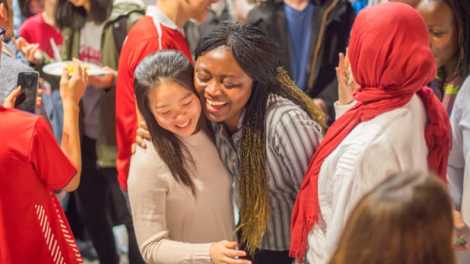 Students smiling for a photograph