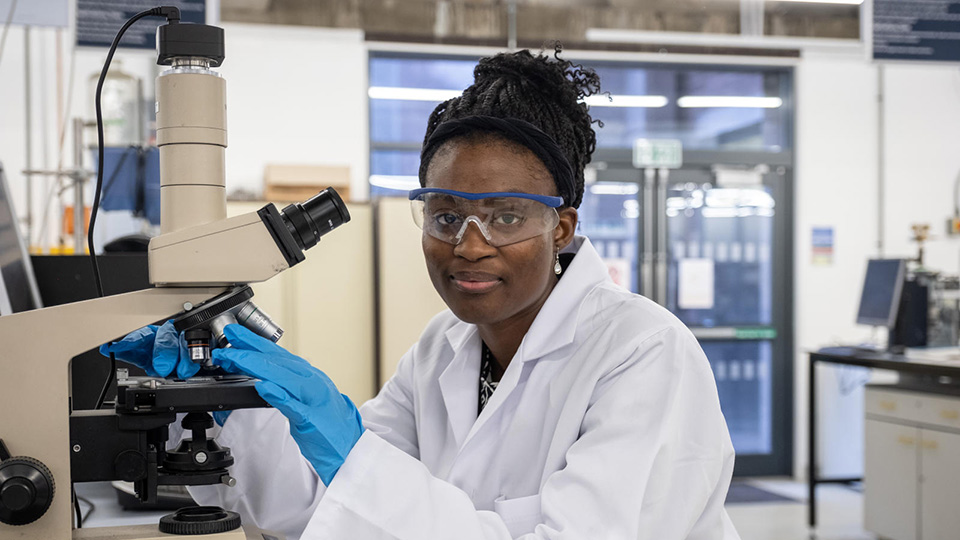 rachael studying in a Chemical Engineering Lab