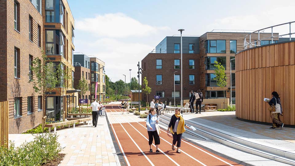 two students walking on campus