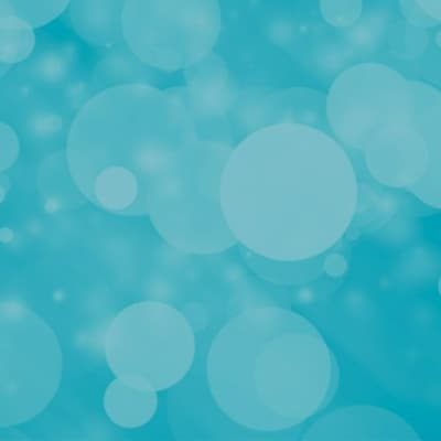 The image is a bokeh effect background featuring various sizes of defocused, overlapping circles in shades of cyan and light blue.